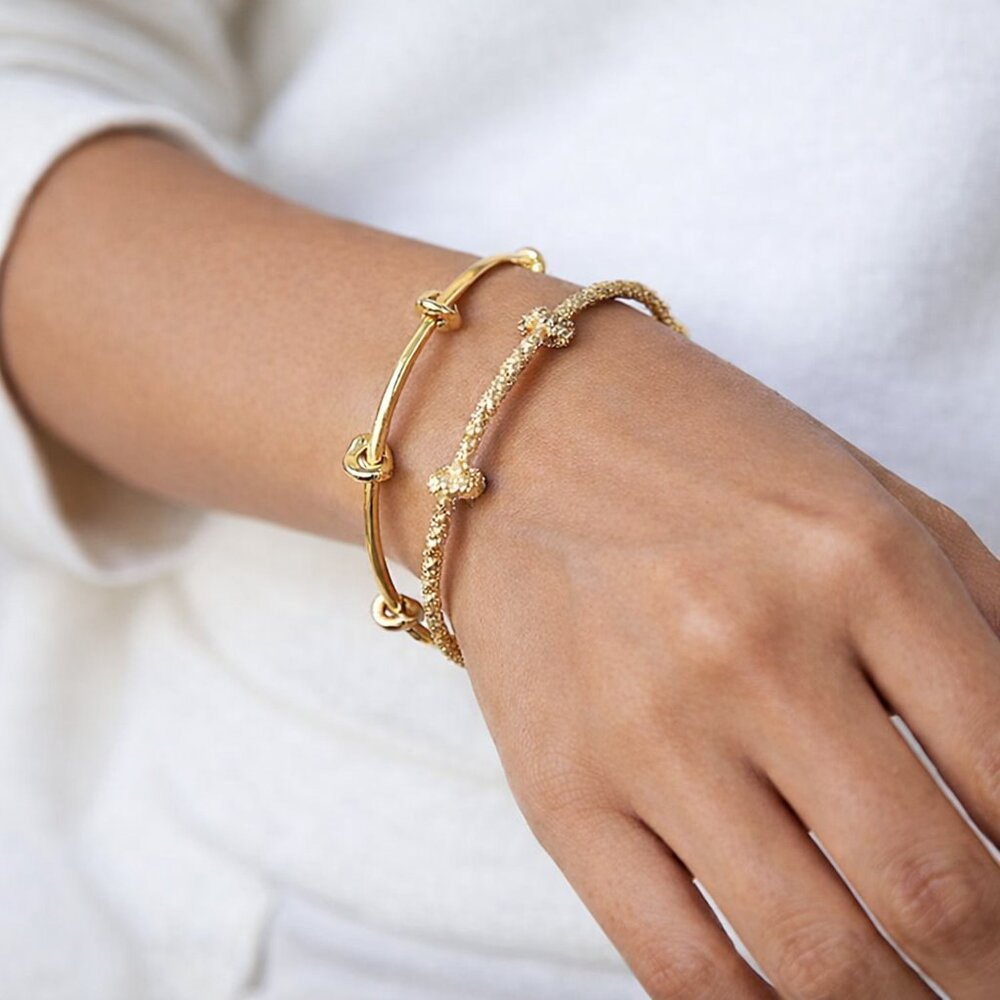2 Gold Tone Bangle Bracelets